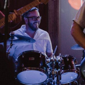 Photo of Dr. Nathaniel G. Chapman playing drums 